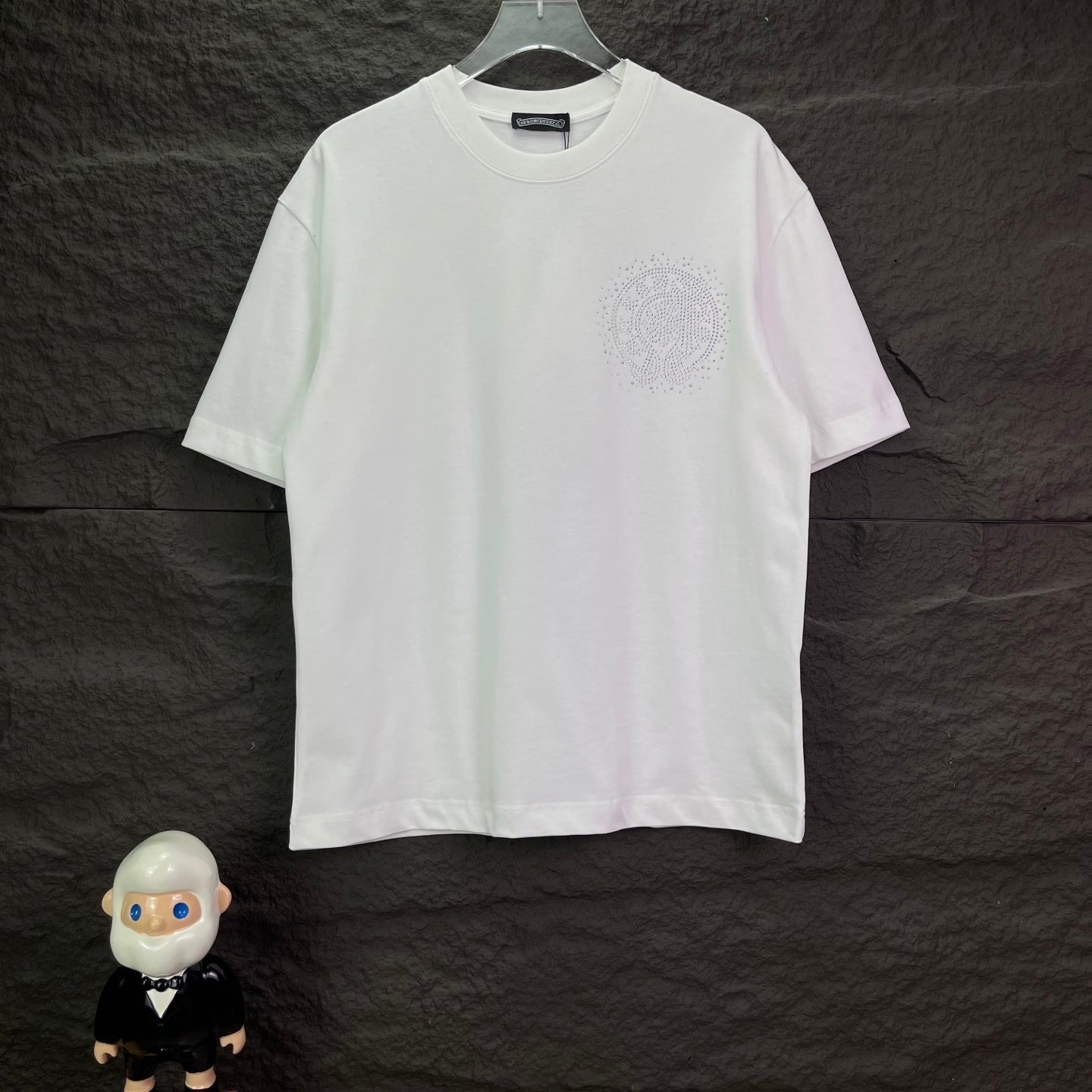 White short-sleeve T-shirt with small rhinestone logo on the chest
