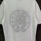 White short-sleeve T-shirt with large rhinestone emblem on the back