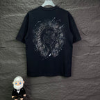 Black short-sleeve T-shirt with large rhinestone-style emblem graphic on back.
