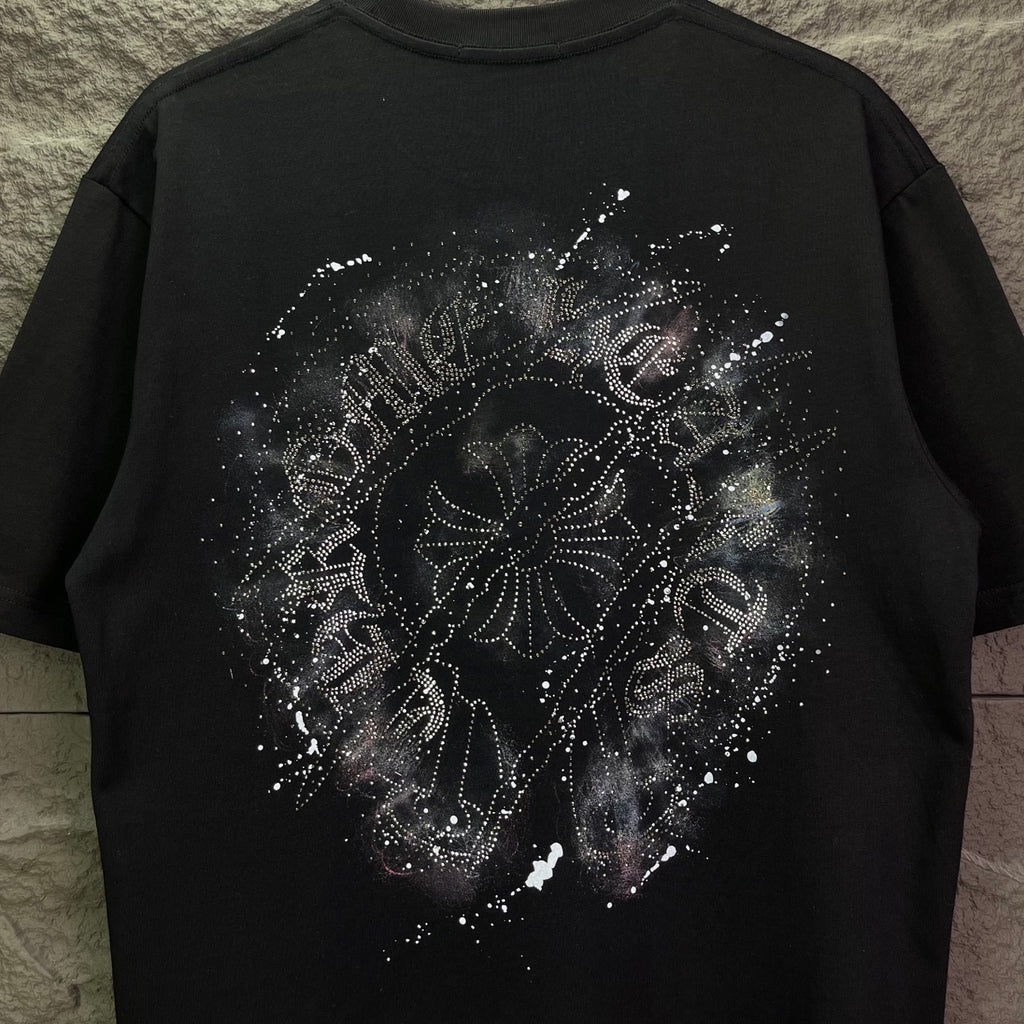 Black short-sleeve T-shirt with large rhinestone emblem graphic on back.