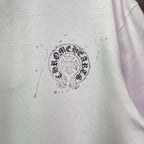 White T-shirt with round rhinestone crest graphic at chest