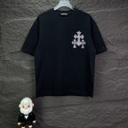Black short-sleeve T-shirt with small rhinestone cross on left chest