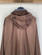 Brown long hooded jacket with draped hood, back view