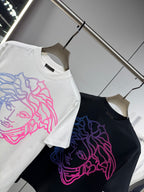White and black Versace T-shirts on hangers with neon Medusa outline front prints