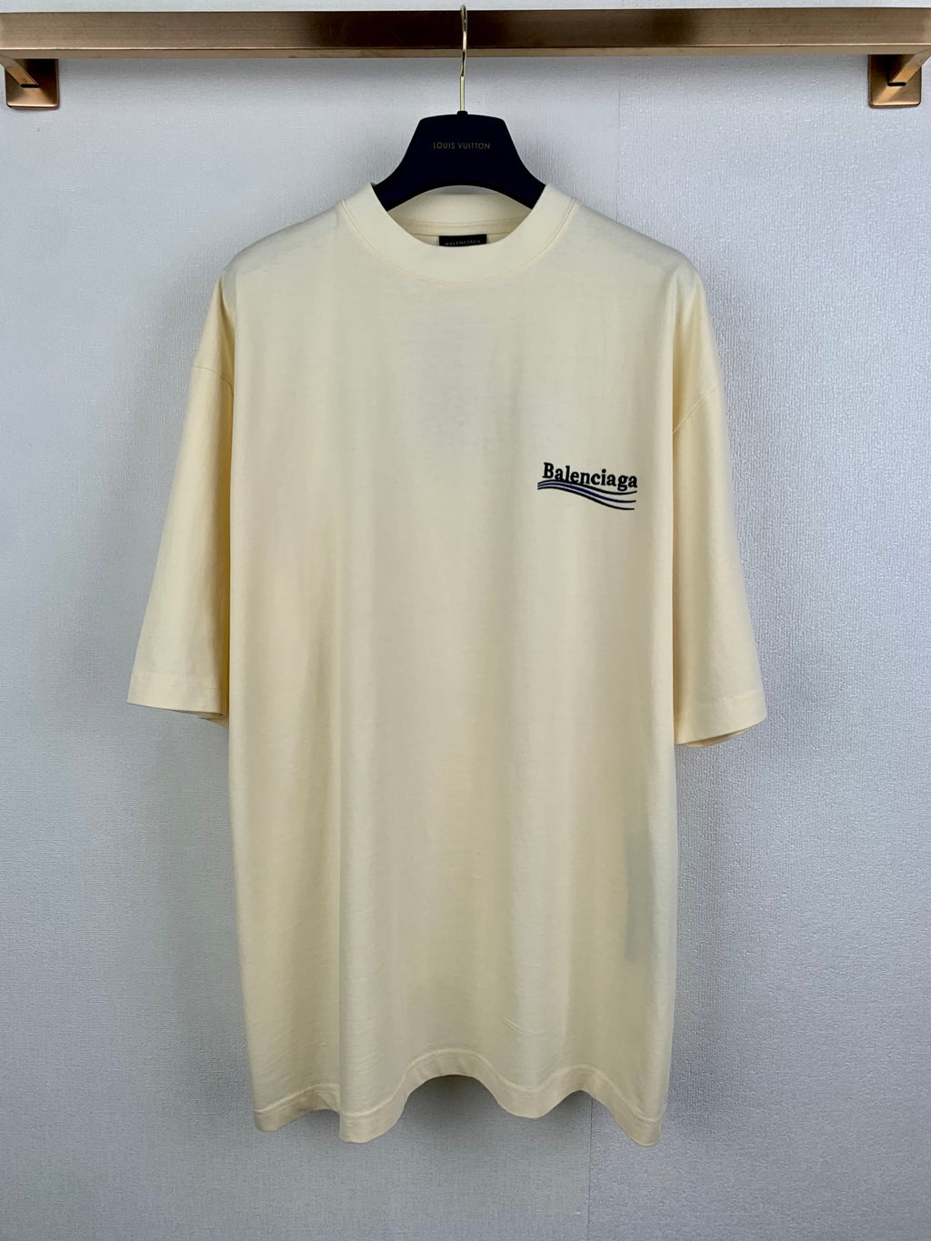 Cream short-sleeve T-shirt with crew neck and small Balenciaga chest logo