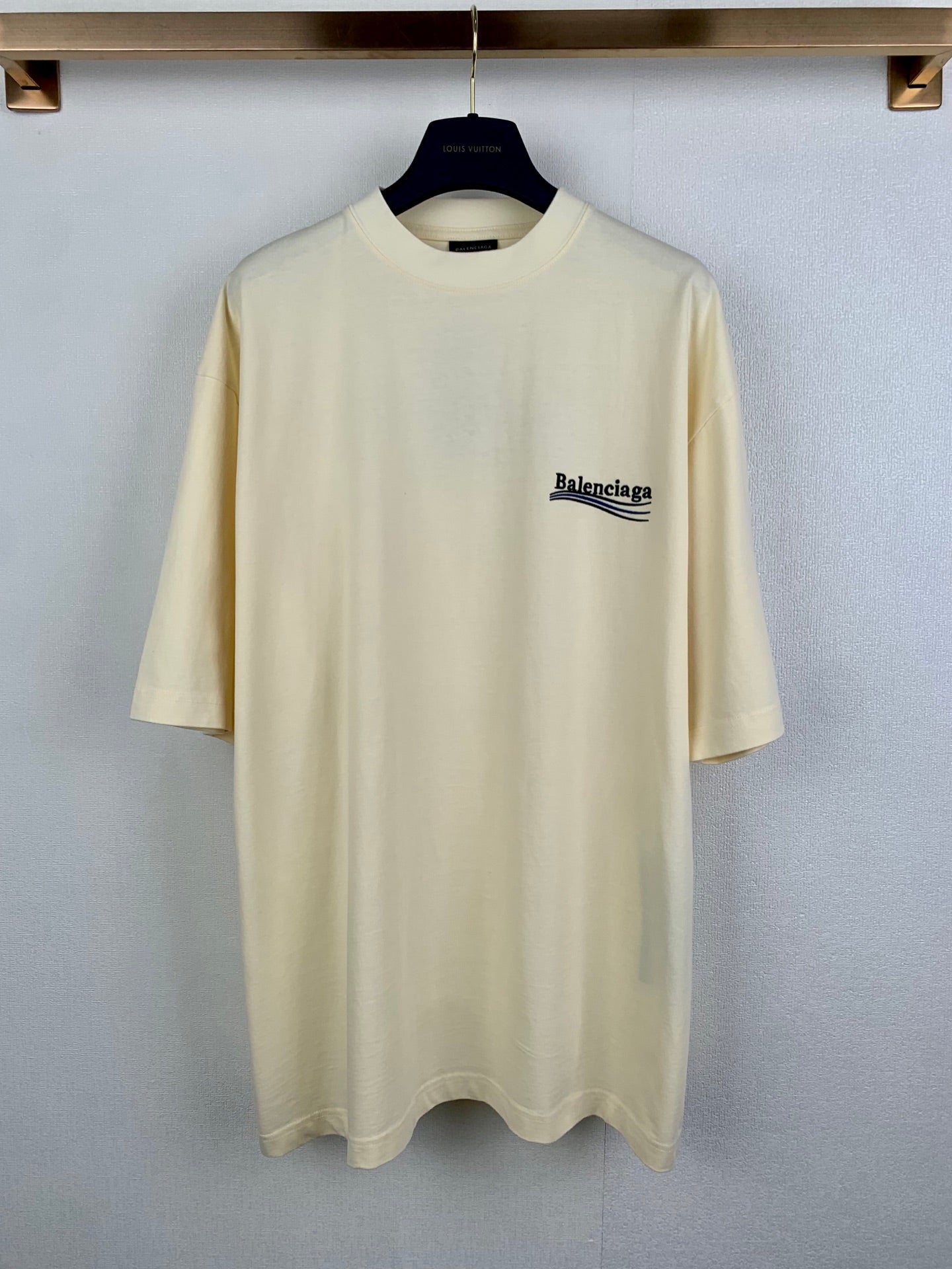 Cream short-sleeve T-shirt with crew neck and small Balenciaga chest logo