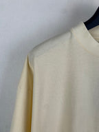 Light yellow Balenciaga T-shirt shoulder and neckline detail