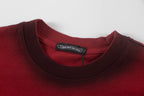 Burgundy crew-neck T-shirt collar with brand label