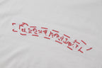 White fabric with red embroidered-style banner and scroll-like lettering