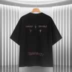 Black short-sleeve T-shirt back with red/white cross and emblem designs