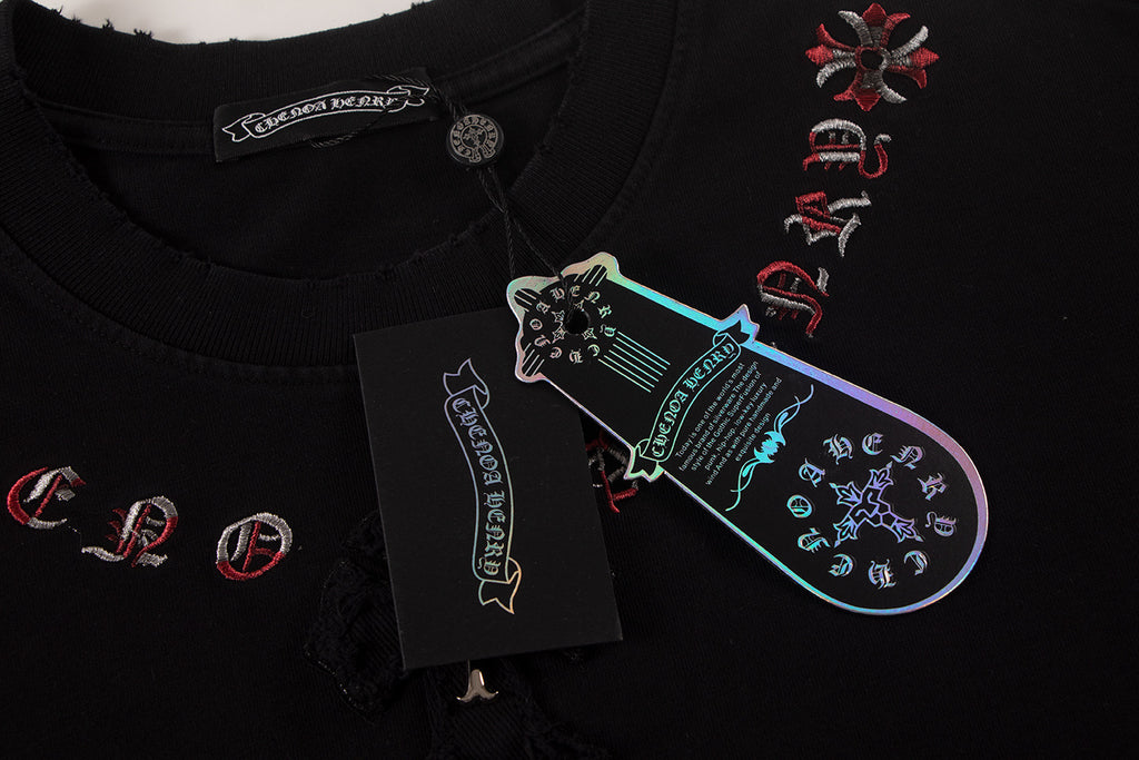 Black T-shirt with multicolor front graphic and hanging brand tag
