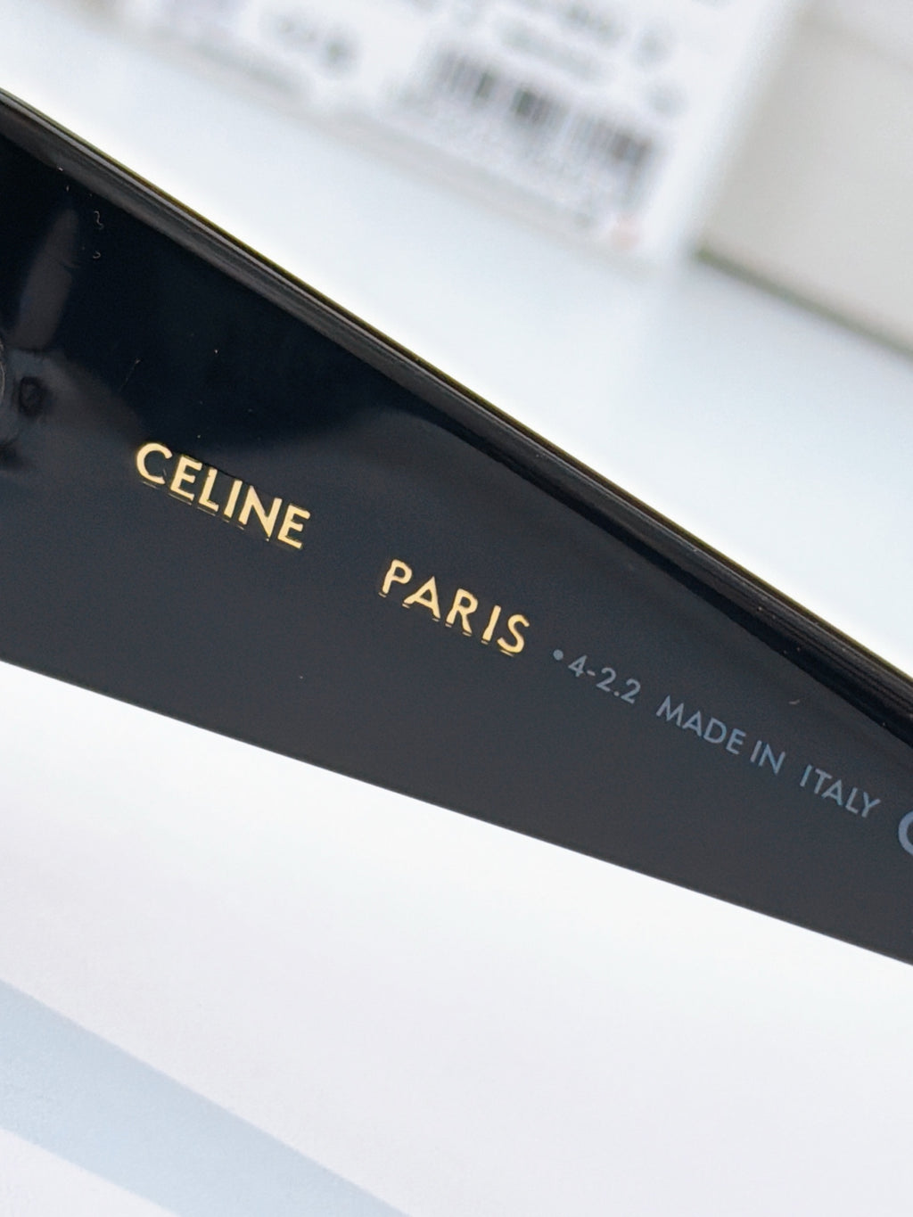 Sunglasses arm with “CELINE PARIS” text and size/“MADE IN ITALY” markings.