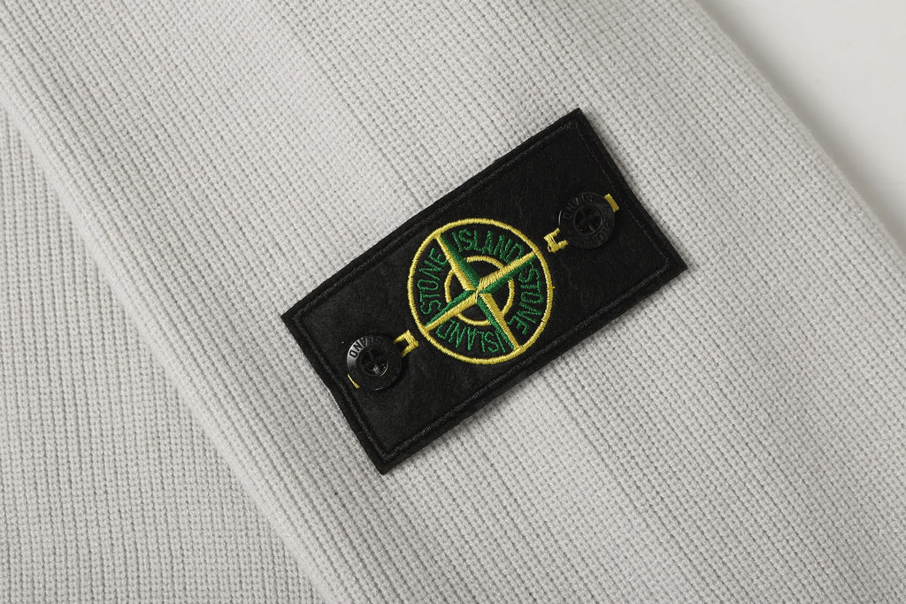 Light gray knit jacket sleeve patch with Stone Island logo