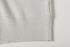 Light gray ribbed knit jacket hem cuff detail with clean edge