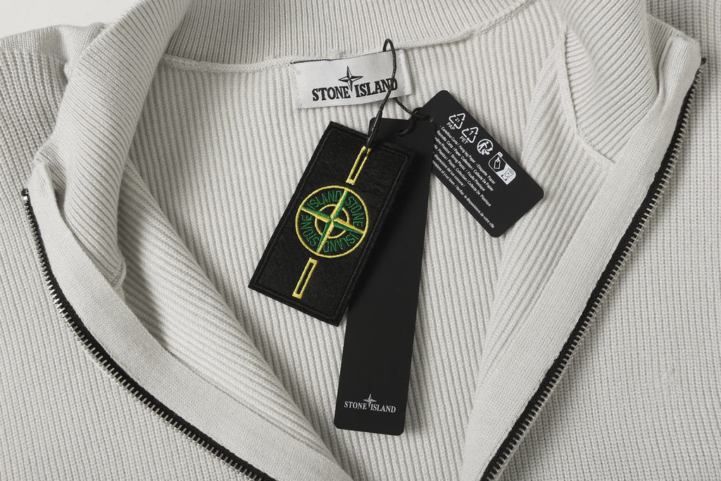 Stone Island knit jacket with neck tag and visible zipper from inside