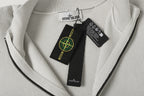 Stone Island knit jacket with neck tag and visible zipper from inside
