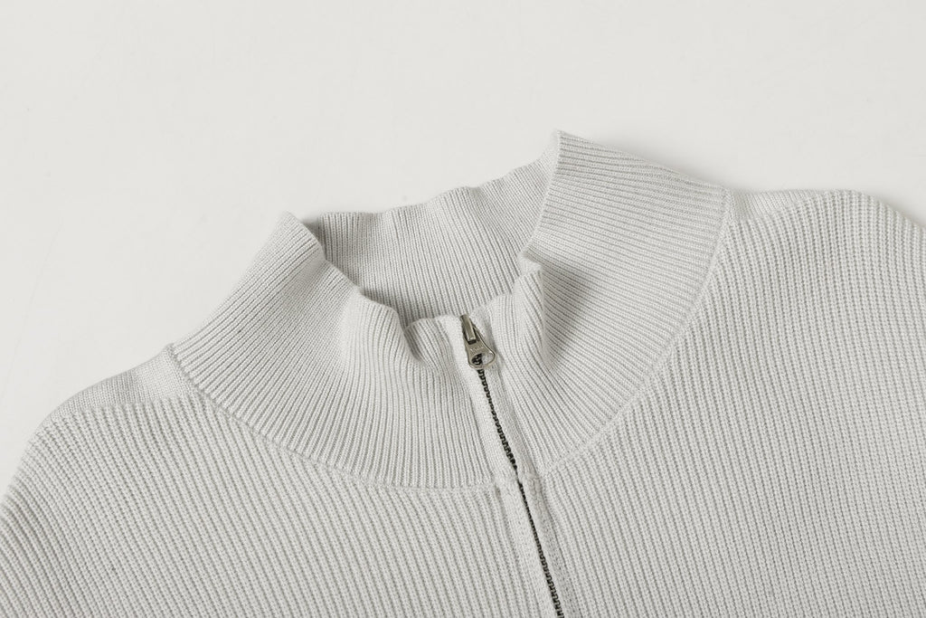 Light gray knit jacket stand collar with front zipper and metal pull