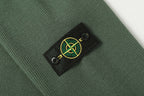 Stone Island logo patch on dark green knit sleeve cuff