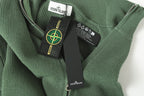 Stone Island zip jacket neckline label and care tag on dark green knit