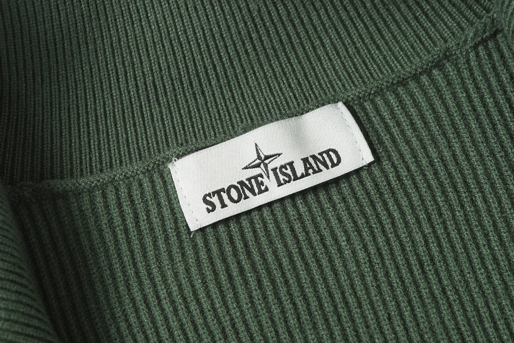Stone Island brand patch on dark green rib-knit collar