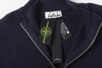 Stone Island knit zip jacket front with logo patch and silver zip pull, dark navy