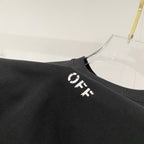 Black T-shirt close-up of OFF text logo on shoulder