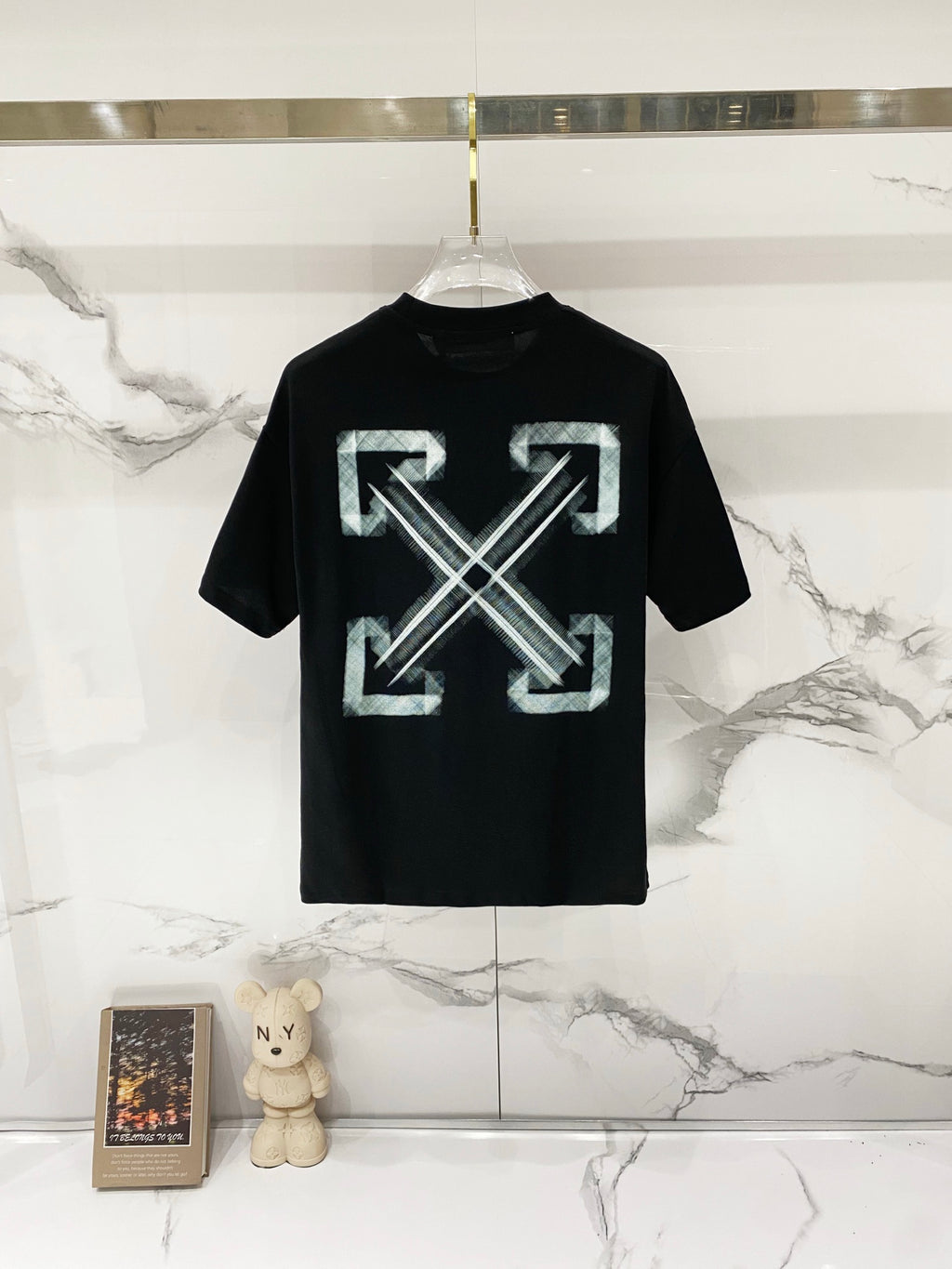 Black T-shirt with large geometric OFF graphic on the front