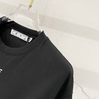 Black T-shirt crew neck with visible interior size tag