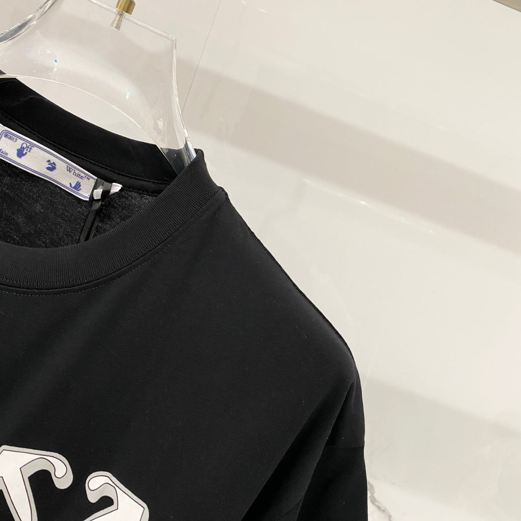 Off White black T-shirt upper body view with partial cross logo