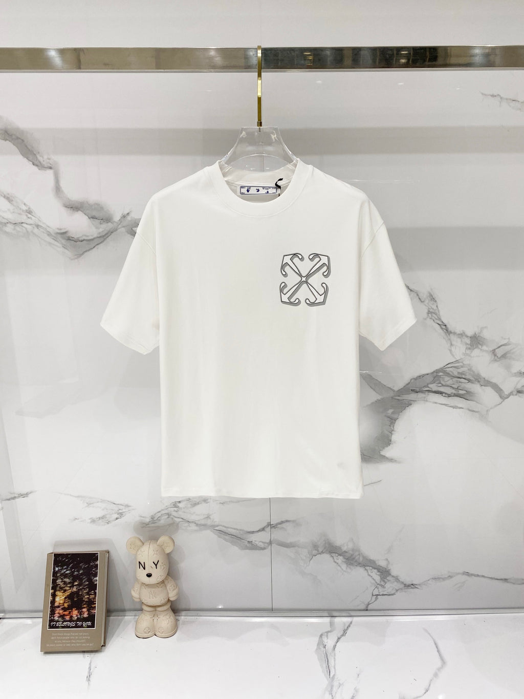 Off-white graphic T-shirt with small chest logo print