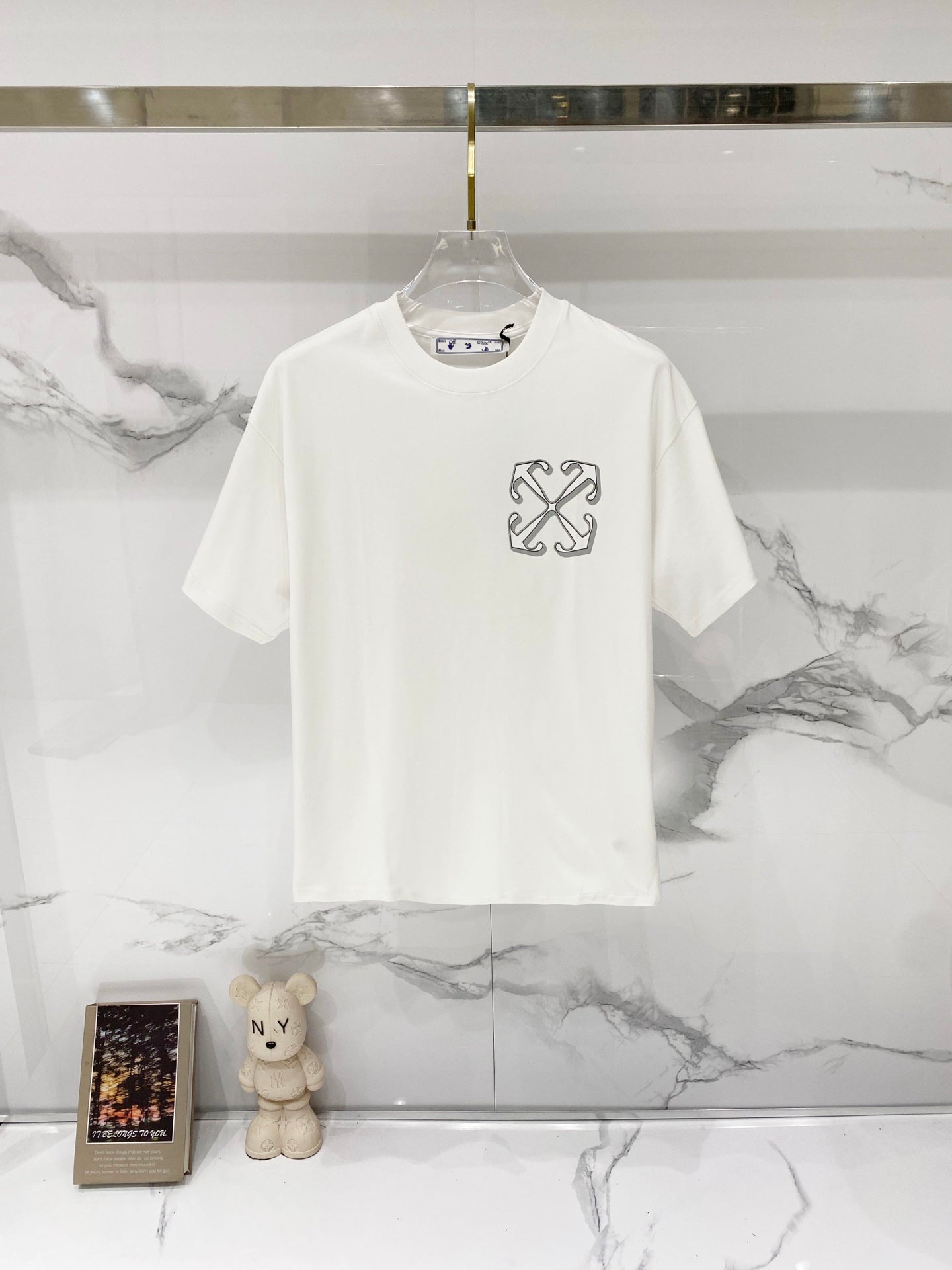 Off-white graphic T-shirt with small chest logo print