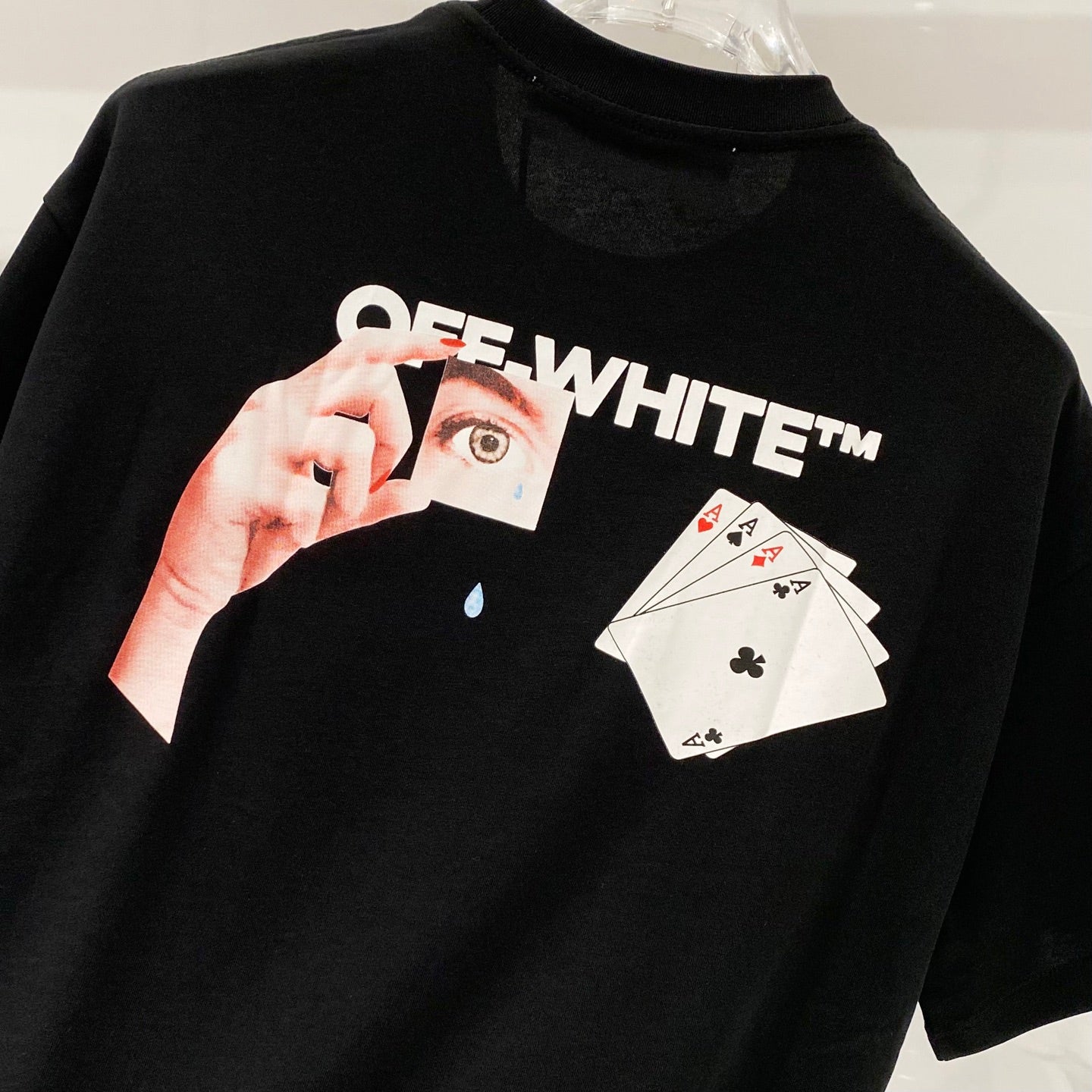 Off-White T-shirt front with OFF-WHITE™ text and poker card graphic