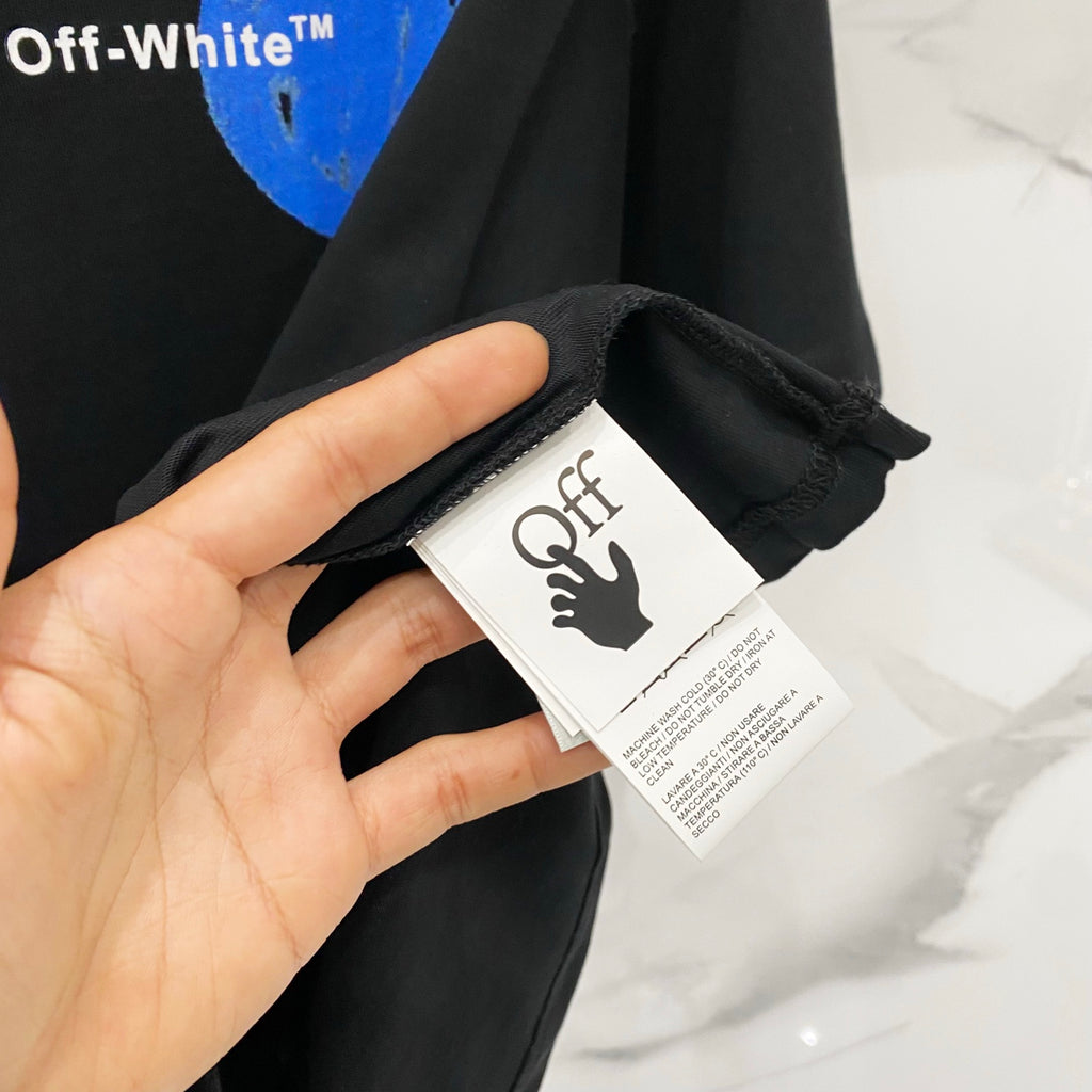 Off-White black T-shirt with neck label visible near the collar
