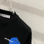 Off-White black T-shirt with small blue heart graphic on the chest