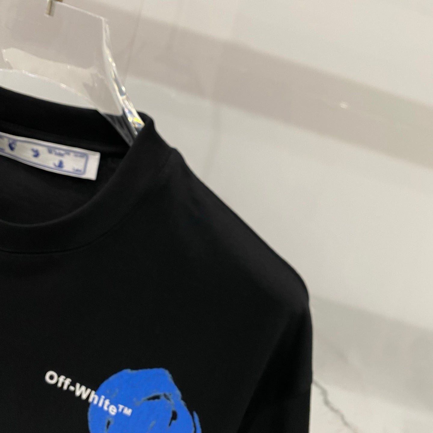 Off-White black T-shirt with small blue heart graphic on the chest