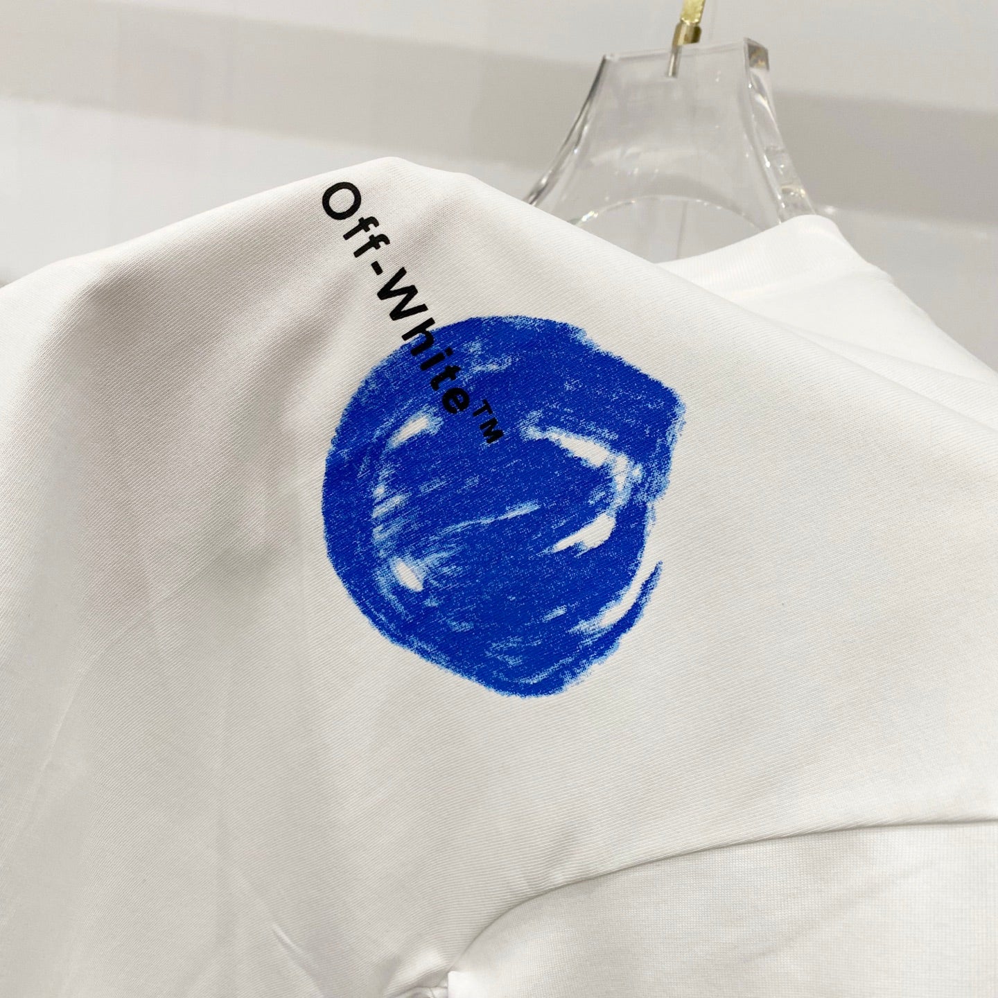 Off-White white T-shirt with blue circular graphic on back