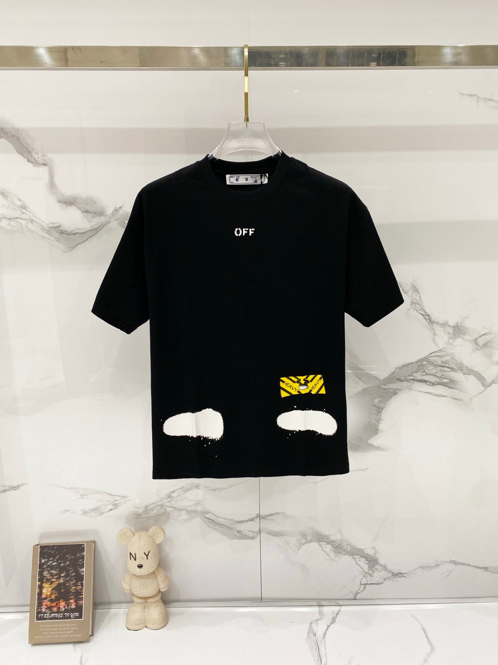 Black T-shirt with 'OFF' logo and white print on front