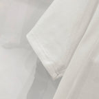 White T-shirt sleeve and side hem seam detail