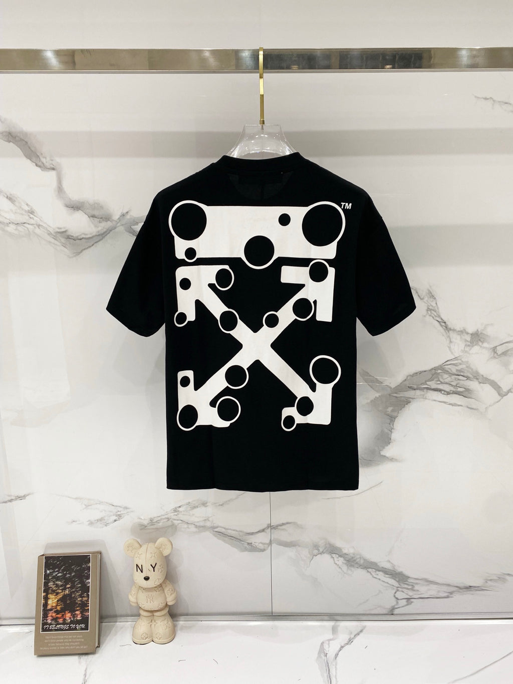 Black T-shirt with large geometric logo print