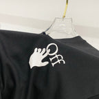 Black T-shirt with large white hand logo print on back