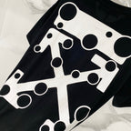 Black T-shirt with oversized white abstract geometric logo print
