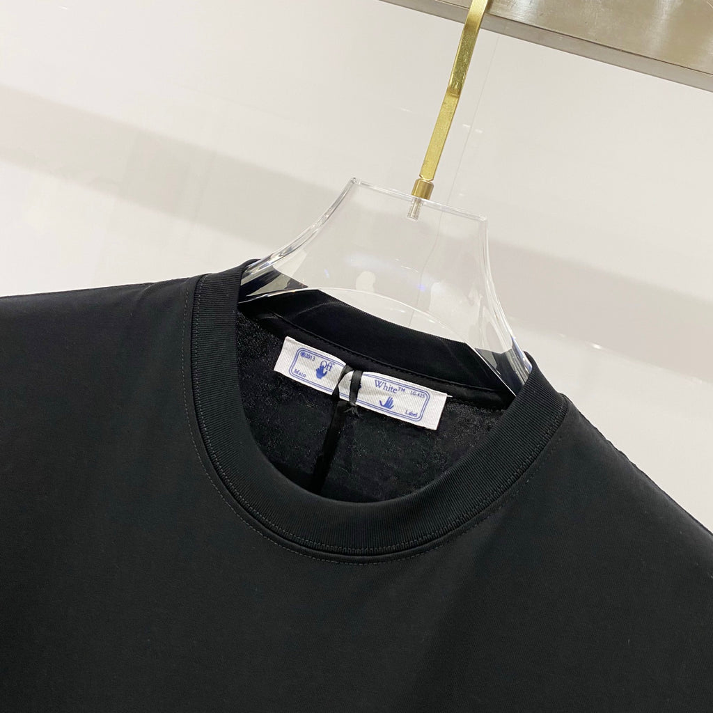 Black crewneck T-shirt neckline with interior brand labels
