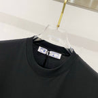 Black crewneck T-shirt neckline with interior brand labels