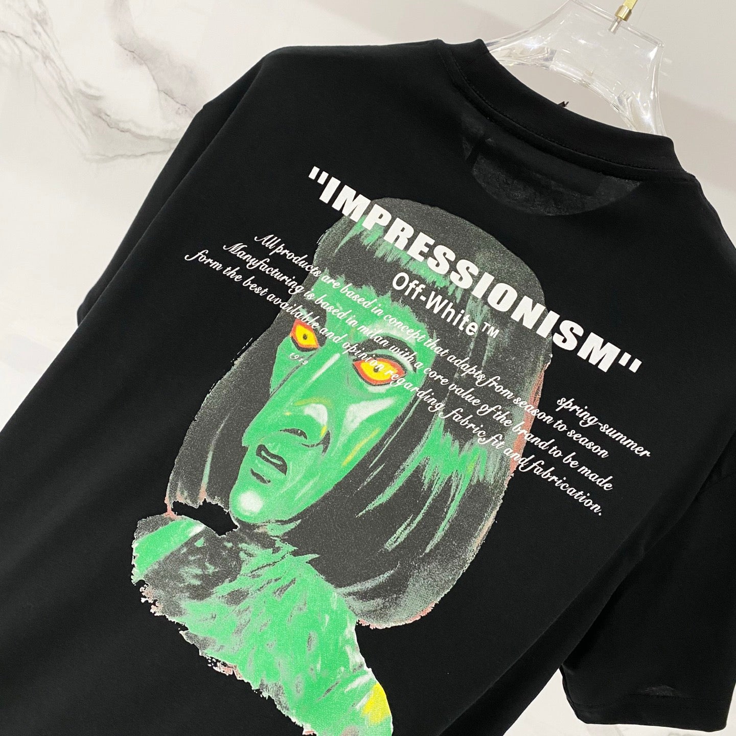 Off-White black T-shirt with large 'IMPRESSIONISM' and green face graphic print