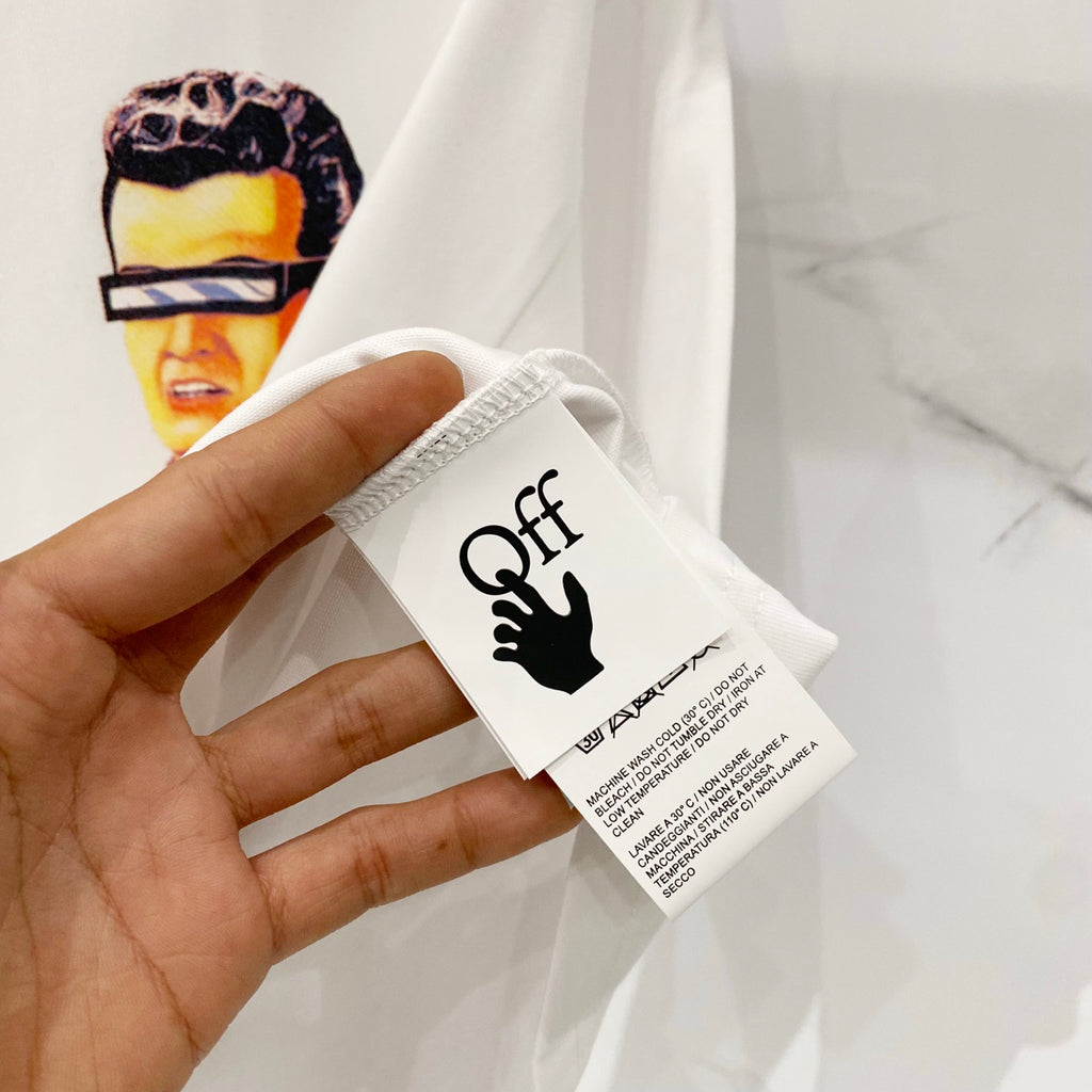 Off-white T-shirt hang tag with black logo and brand text