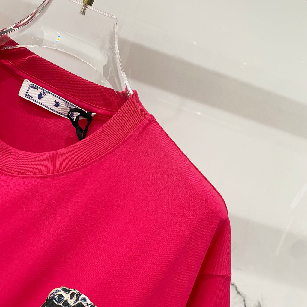 Off White red T-shirt close-up of neckline with inner tag and shoulder area.