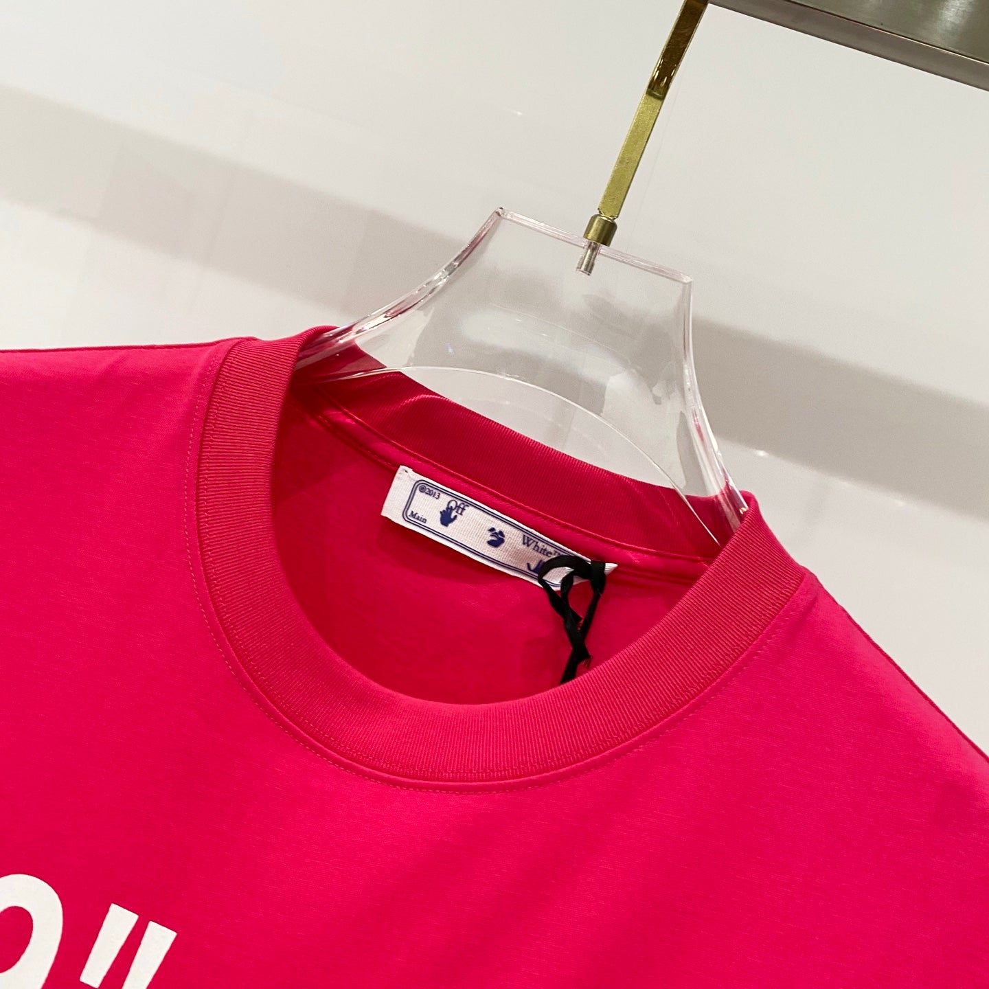 Off White red T-shirt neckline with inner tag detail at collar.