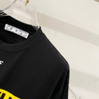 Off-White black T-shirt shoulder with small 'OFF' print and neck tag