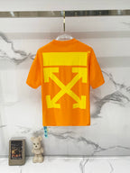 Orange T-shirt on hanger with large yellow back graphic print