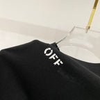 Off-White T-shirt shoulder close-up, black with small OFF lettering